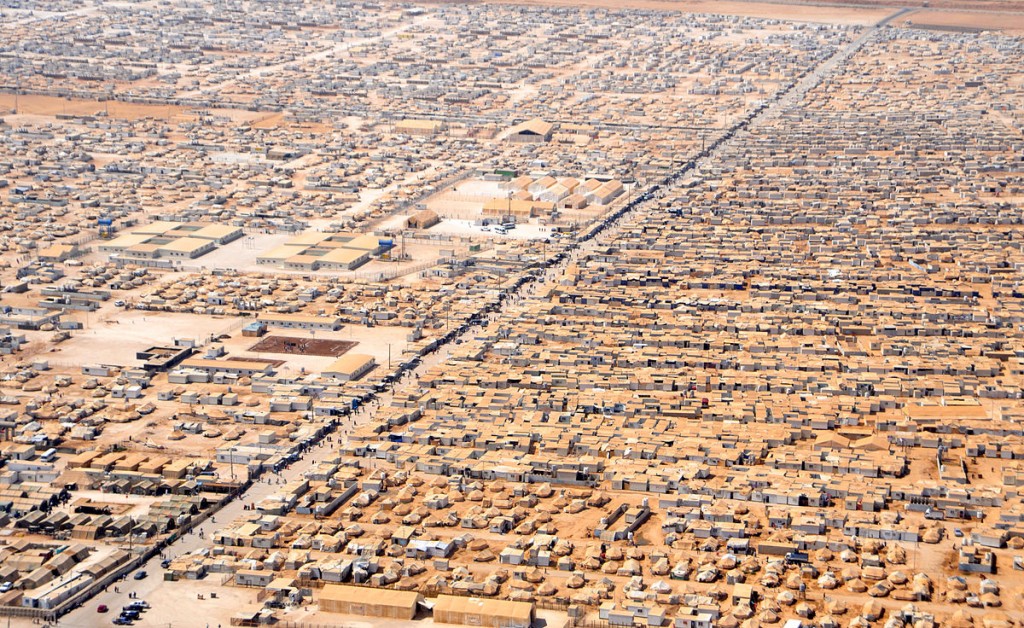 "An Aerial View of the Za'atri Refugee Camp" by U.S. Department of State - http://www.flickr.com/photos/statephotos/9312291491/sizes/o/in/photostream/. Licensed under Public Domain via Commons - https://commons.wikimedia.org/wiki/File:An_Aerial_View_of_the_Za%27atri_Refugee_Camp.jpg#/media/File:An_Aerial_View_of_the_Za%27atri_Refugee_Camp.jpg